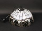 an image of a stained glass lamp shade on a black background