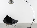 an image of a chair and a lamp in a room