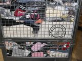 a cart full of stuffed animals inside of a building