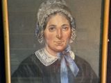 portrait d'une vieille femme portant un bonnet et une robe noire