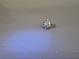 a diamond ring sitting on top of a table