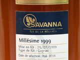 an image of a bottle of wine with a gold label on it