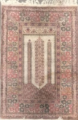 an old rug with an ornate design on it