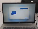 a laptop that has a message on the screen