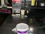 a cup sitting on the counter in the kitchen
