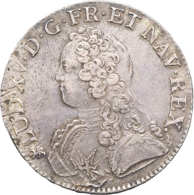 une pièce en argent avec l'image d'un homme de profil