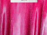 a close up of a pink dress with a label on it