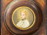 portrait of a woman in a white dress in a wooden frame