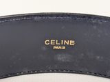 a close up of a black belt with gold lettering on it
