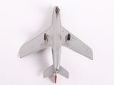 a toy airplane that is hanging on the wall