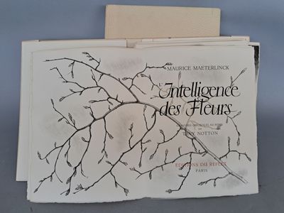 un livre sur lequel figure l'image d'une branche d'arbre