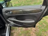 a car door with the door handle open on the side of the car