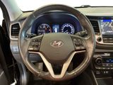 the interior of a car with a steering wheel and dashboard controls