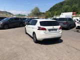 a lot of cars that are parked in a parking lot