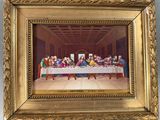 tableau représentant la Cène de Jésus, dans un cadre doré