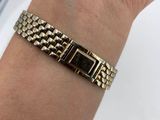 a close up of a person ' s wrist with a watch on it
