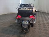 a motorcycle that is parked inside of a building