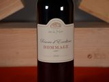 a bottle of wine that is sitting on a table