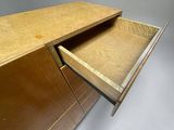 an image of a wooden desk with a drawer underneath it