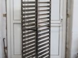 an image of a metal pan rack in a room