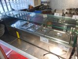 a picture of a kitchen with a counter top and a sink