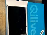 a box with a phone inside of it sitting on a table