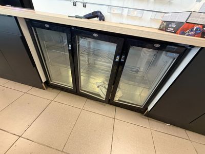 a picture of a commercial refrigerator in a store