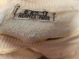 a label that says hermes paris on the back of a pair of socks