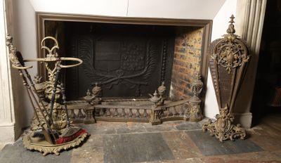 a fire place in the middle of a room with a fireplace