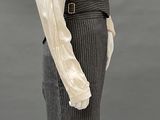 an image of a mannequin wearing a skirt and blouse