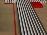 a picture of a piano keyboard laying on the floor