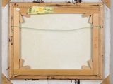 an image of a painting on a easel with a piece of paper taped to it
