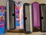 a lot of different types of luggage on the floor