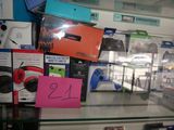 a display case full of video game controllers for sale
