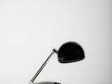 an image of a desk lamp on a white surface