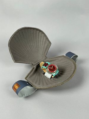 SWATCH soupe de poisson, gamme Pop art dans son emballage d'…