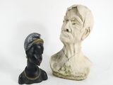a bust of a woman next to a bust of a man