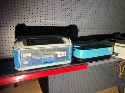 two bins on a shelf in a store