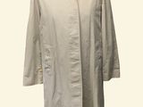 an image of a white coat on a mannequin