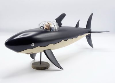une illustration en noir et blanc représentant un requin et un homme dans un bateau