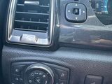 the interior of a car with a dashboard and air conditioner controls