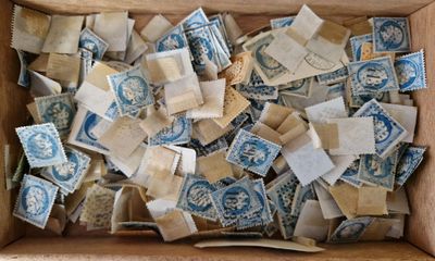 a box full of old postage stamps in it
