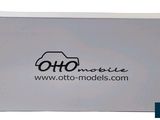 a white box with the logo of a car on it