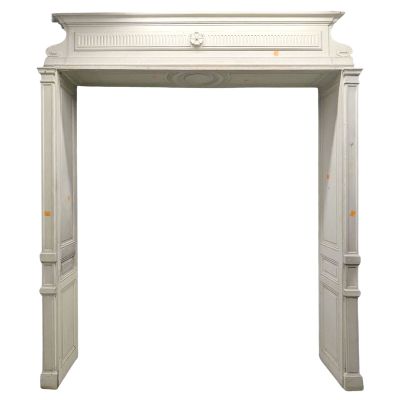 an image of a white fireplace mantel with a clock on top
