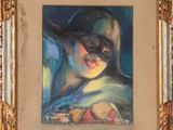 tableau représentant une femme portant un masque, dans un cadre doré