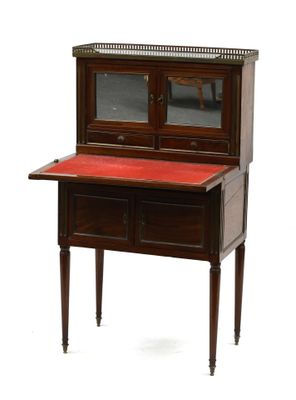une image représentant un petit bureau au plateau rouge
