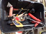 many different tools in a toolbox on the side of a building
