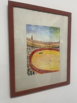 framed painting of a bullfight arena with a cat in the foreground
