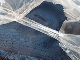 a piece of cake wrapped in plastic sitting on a table
