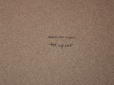 a picture of a brown box with writing on it